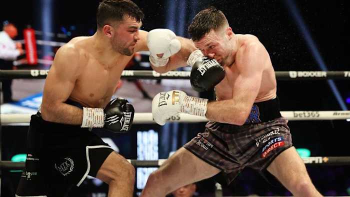 Jack Catterall throws a left into Josh Taylor at the OVO Hydro, Glasgow. Josh Taylor and Jack Catterall will square off in a highly awaited rematch on Saturday, April 27, at the First Direct Arena in Leeds. STEVE WELSH/PA VIA GETTY IMAGES. 